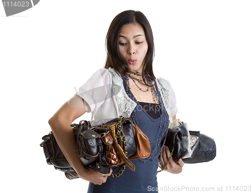 Image of woman with many a purses