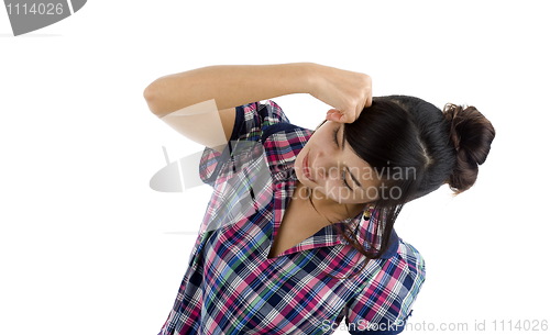 Image of woman hitting herself