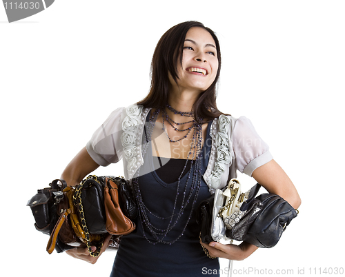 Image of woman with many a purses
