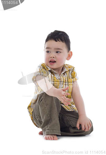 Image of boy sitting on the floor