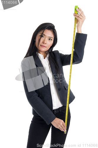 Image of business woman with ruler 