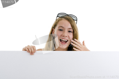 Image of blond girl with blank display board