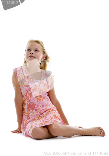 Image of blond girl sitting in studio