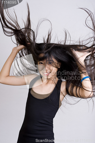 Image of teenager with very long hair