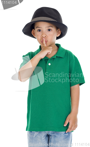 Image of boy with finger on lips