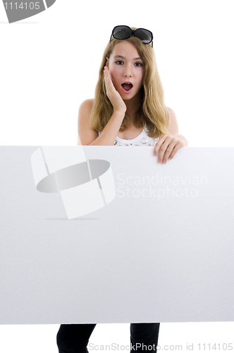 Image of blond girl with blank display board