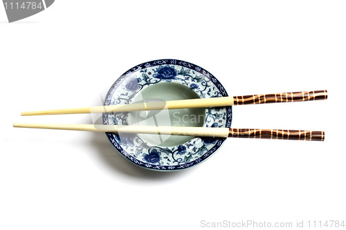 Image of Wood chopsticks and plate