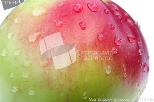 Image of Apple with drops close up.