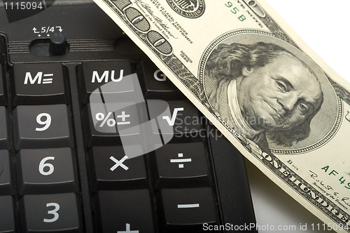 Image of The calculator and money.