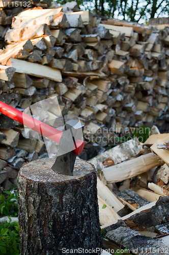 Image of Axe and woodpile.