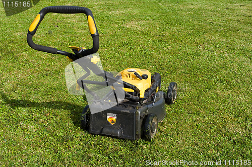 Image of Lawnmower on a lawn.