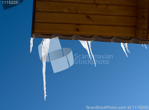 Image of Icicles on a roof.