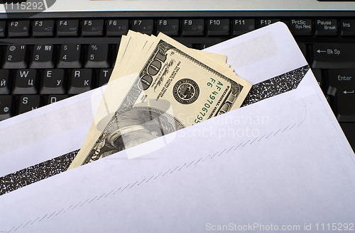 Image of Money and notebook.