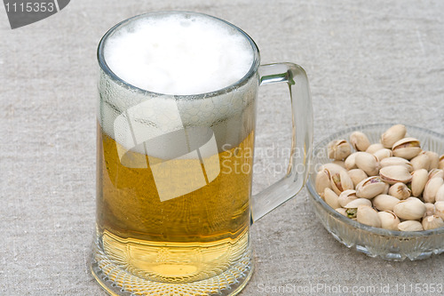 Image of Beer and pistachios.