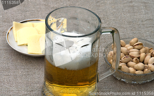 Image of Beer and appetizer.