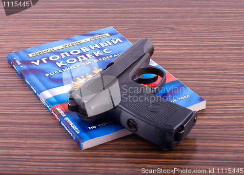 Image of Arms and the book.