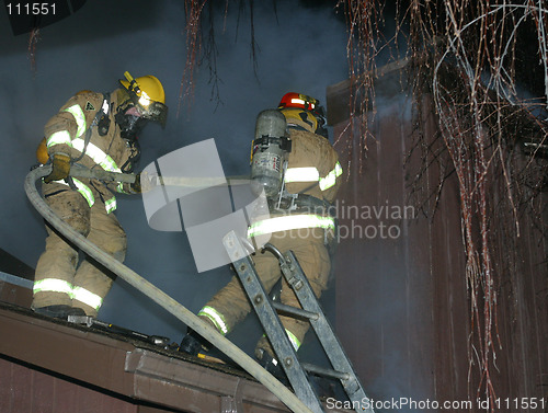 Image of two firefighters