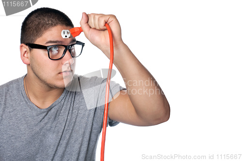 Image of Man Plugging Himself In