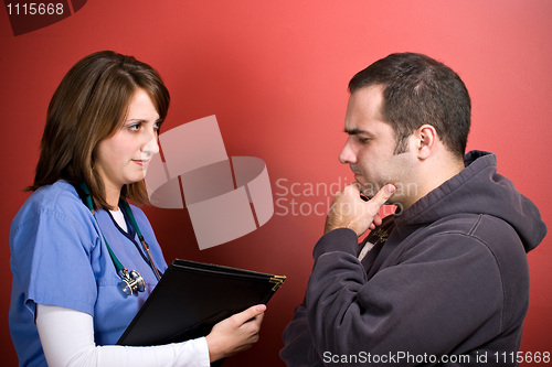 Image of Man Talking To The Doctor