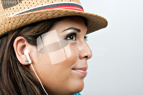 Image of Woman Wearing Earbud Headphones