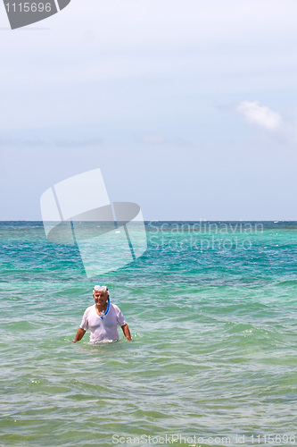 Image of Senior Citizen Snorkeling in Tropical Waters