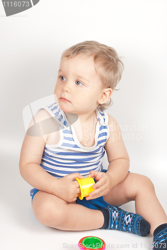 Image of boy with a toy