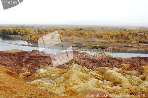 Image of Colorful hills by the river