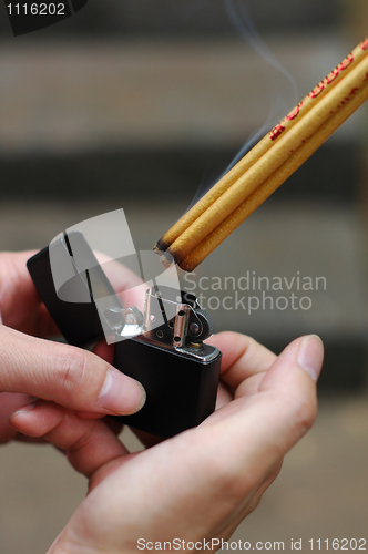 Image of Lighting joss sticks