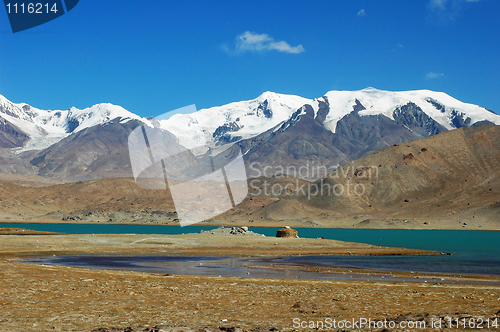 Image of Landscape of snow mountains and blue lake