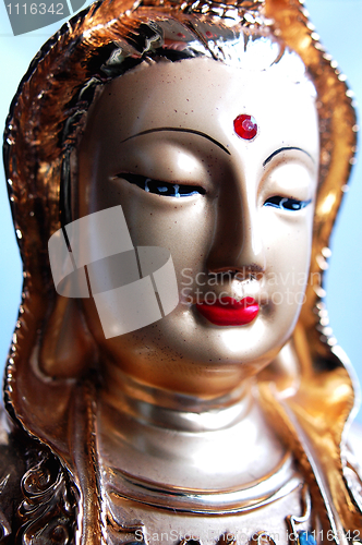 Image of Closeup view of a golden buddha statue