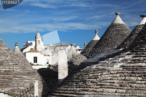 Image of trulli roof and blue sky