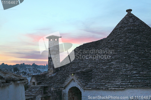 Image of trulli at sunset