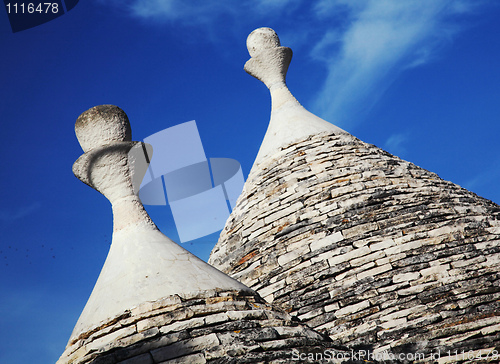 Image of trulli roof and blue sky