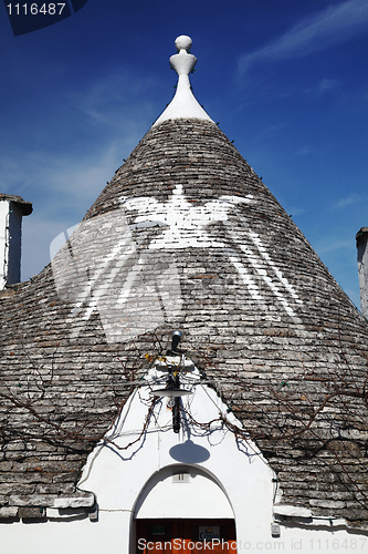 Image of trulli roof and blue sky