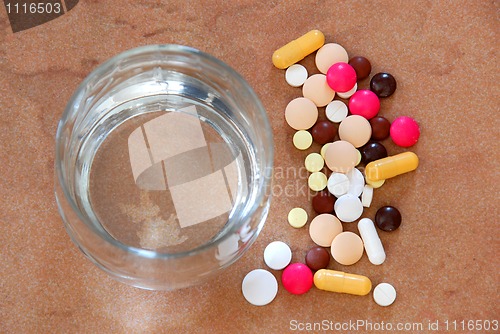 Image of Pills and water glass