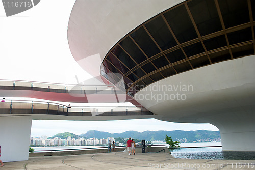 Image of Oscar Niemeyer's Niteroi Contemporary Art Museum and Sugar Loaf, in Rio de Janeiro, Brazil