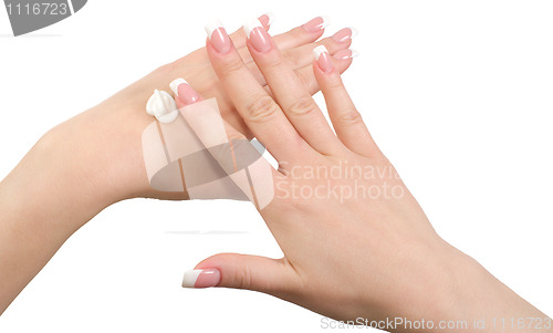 Image of Applying hand cream.