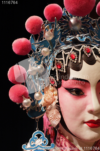 Image of chinese opera dummy and black cloth as text space 