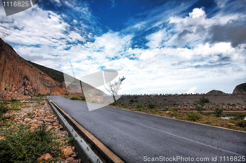 Image of Asphalt road in mountains 