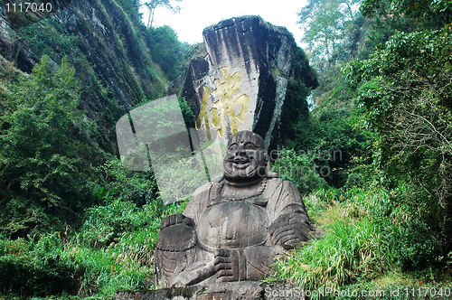 Image of Statue of smiling buddha