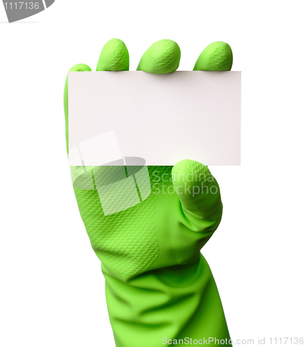 Image of Hand in green glove showing business card