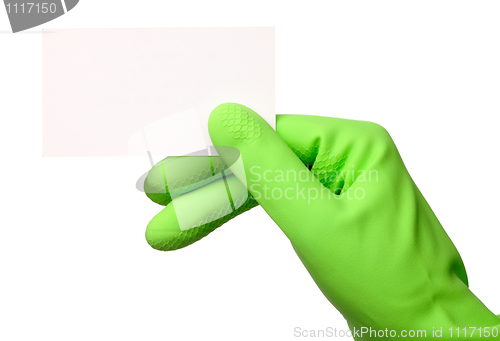 Image of Hand in green glove showing business card