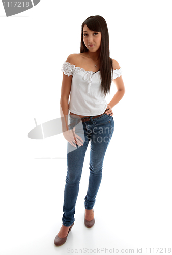 Image of Beautiful girl wearing skinny jeans and top