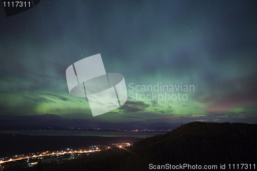 Image of Aurora Borealis over alaskan towns