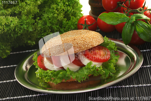 Image of Bagel with tomato and mozzarella