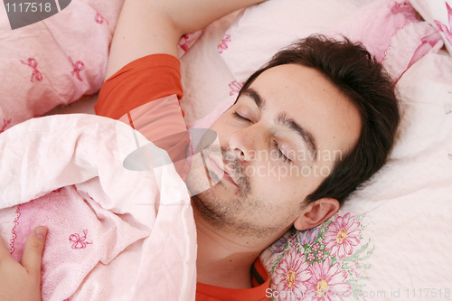 Image of Portrait of a young man sleeping.