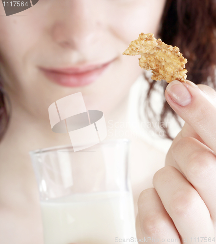 Image of Young people eating milk with cereals