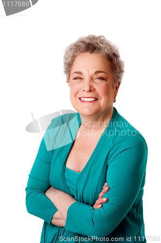 Image of Happy smiling senior woman with arms crossed