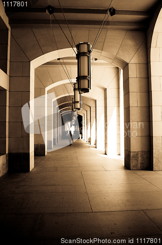 Image of Curving Colonnade Tunnel of Federal building  