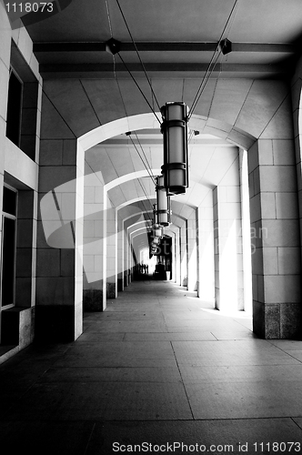 Image of Curving Colonnade Tunnel of Federal building  